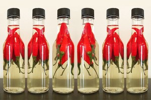 row of pepper sauce bottles