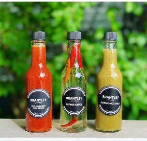 red jalapeno sauce, pepper sauce and green serrano hot sauce